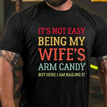 It's Not Easy Being My Wife's Arm Candy But Here I Am Nailing It Graphic T-Shirt
