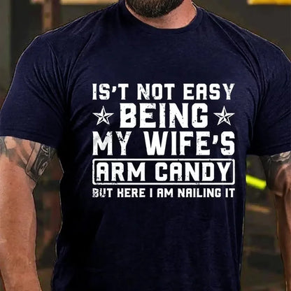 It's Not Easy Being My Wife's Arm Candy But Here I Am Nailing It Graphic T-Shirt