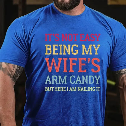 It's Not Easy Being My Wife's Arm Candy But Here I Am Nailing It Graphic T-Shirt