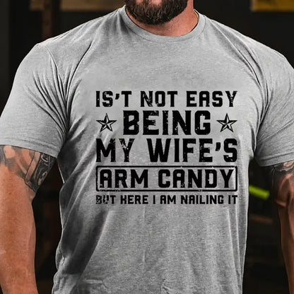 It's Not Easy Being My Wife's Arm Candy But Here I Am Nailing It Graphic T-Shirt